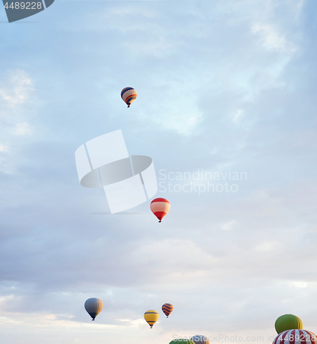 Image of Group of air balloons flying in the sky