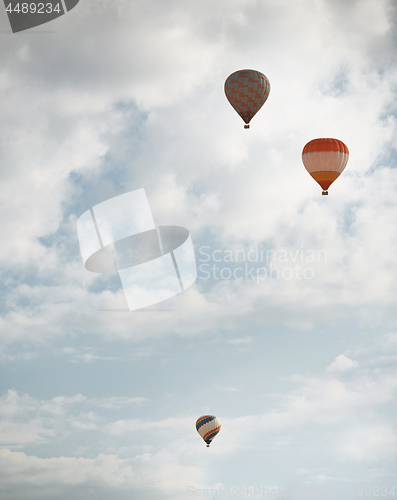 Image of Three air balloons flying in the sky