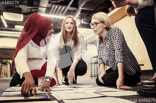 Image of black muslim woman having meeting with Multiethnic  startup busi