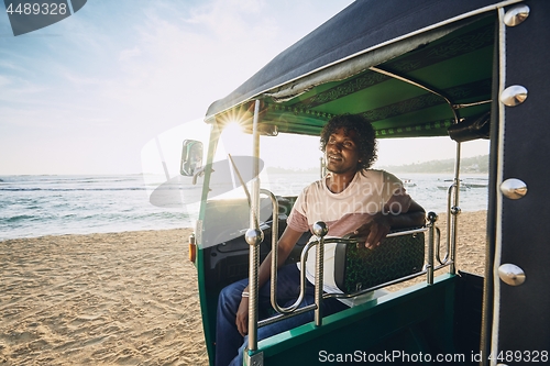 Image of Portrait of tuk tuk driver