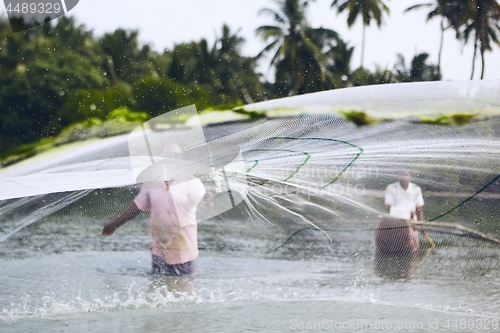 Image of Fishermen with fishing net