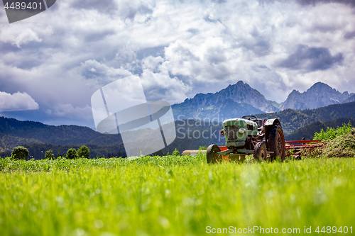 Image of Old tractor in the Alpine meadows