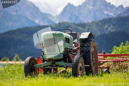 Image of Old tractor in the Alpine meadows