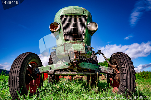 Image of Old tractor in the Alpine meadows