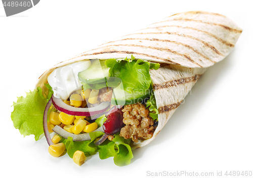 Image of Tortilla wrap with fried minced meat and vegetables