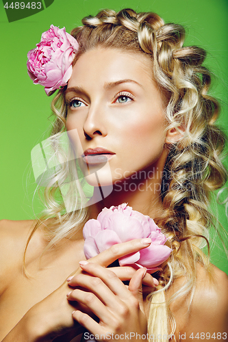 Image of Beautiful girl with peony flower