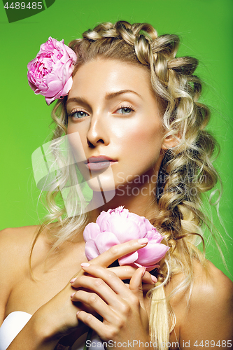 Image of Beautiful girl with peony flower