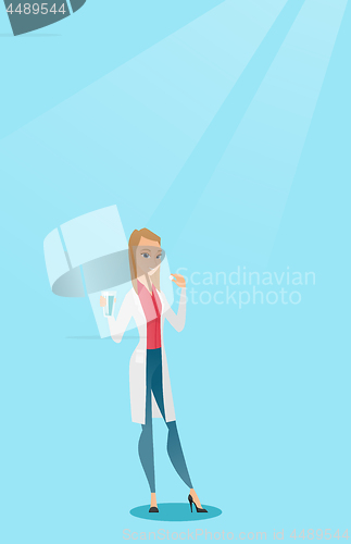 Image of Young caucasian doctor taking pills.