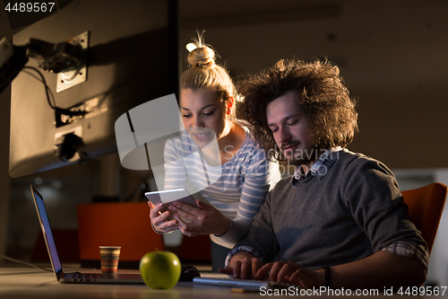 Image of young designers in the night office