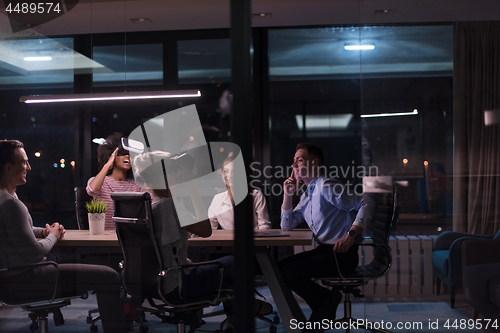 Image of Multiethnic Business team using virtual reality headset