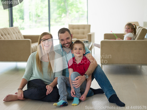 Image of family with little boy enjoys in the modern living room