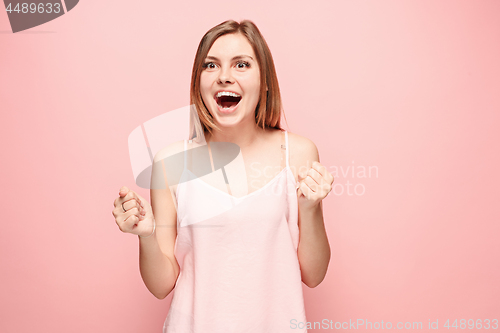 Image of Winning success woman happy ecstatic celebrating being a winner. Dynamic energetic image of female model