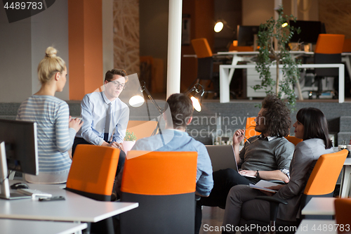 Image of Young Business Team At A Meeting at modern office building
