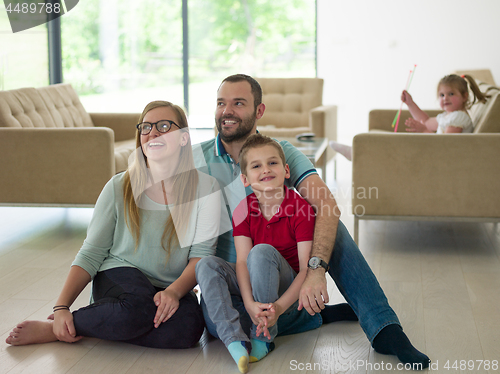 Image of family with little boy enjoys in the modern living room