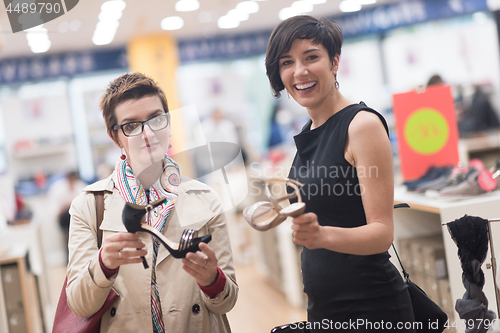 Image of best friend shopping in big mall