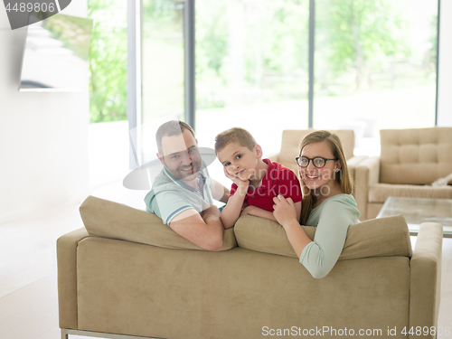 Image of family with little boy enjoys in the modern living room
