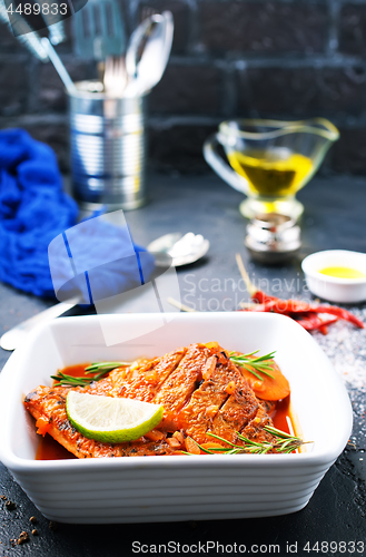 Image of fish with tomato sauce 