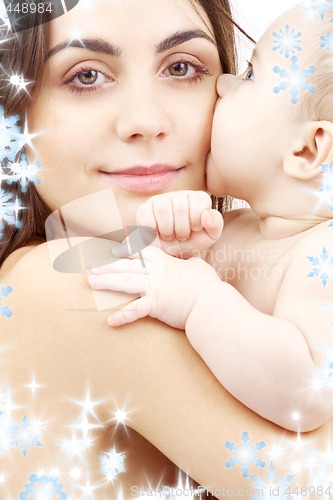 Image of portrait of happy mother with baby 