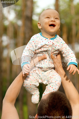 Image of Baby Boy or Girl Have Fun Outdoors