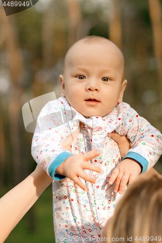 Image of Baby Boy or Girl Have Fun Outdoors