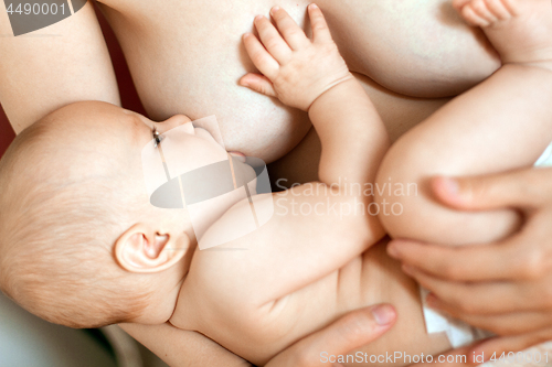 Image of Mother Breast Feeding Baby