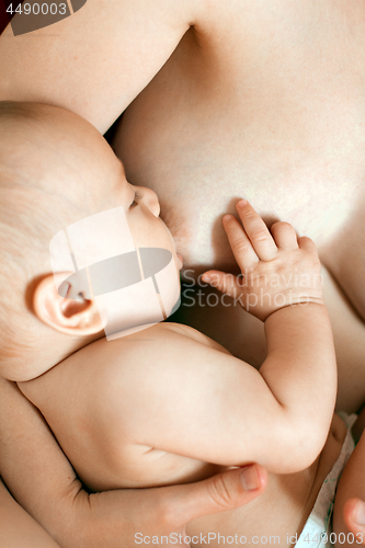 Image of Mother Breast Feeding Baby