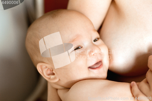 Image of Mother Breast Feeding Baby