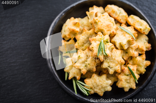 Image of Delicious homemade cookies with parmesan cheese and rosemary