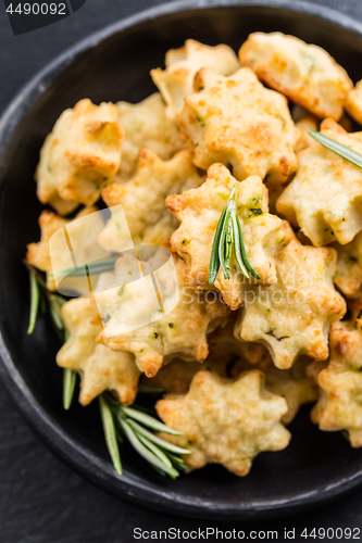 Image of Delicious homemade cookies with parmesan cheese and rosemary