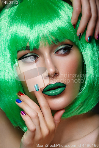 Image of Beautiful girl in green wig