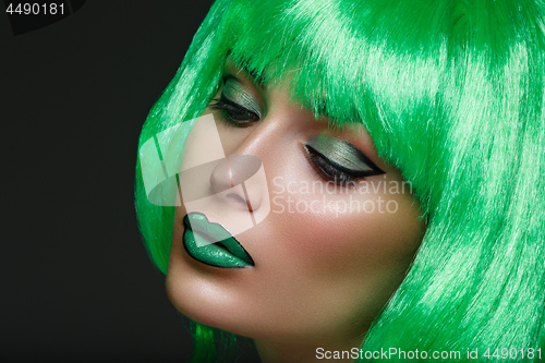 Image of Beautiful girl in green wig