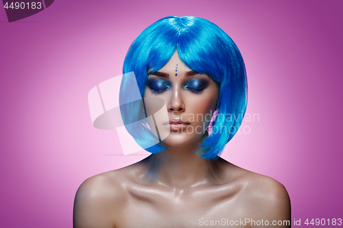 Image of Beautiful girl in blue wig