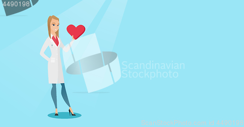 Image of Doctor cardiologist holding heart.