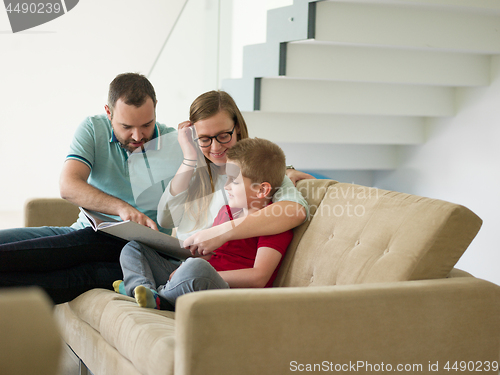 Image of family with little boy enjoys in the modern living room
