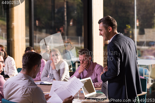 Image of Business Team At A Meeting at modern office building