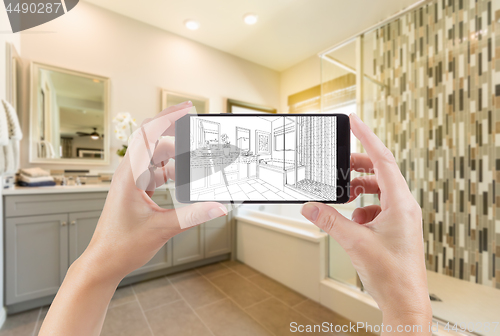 Image of Hands Holding Smart Phone with Master Bathroom Drawing on Screen