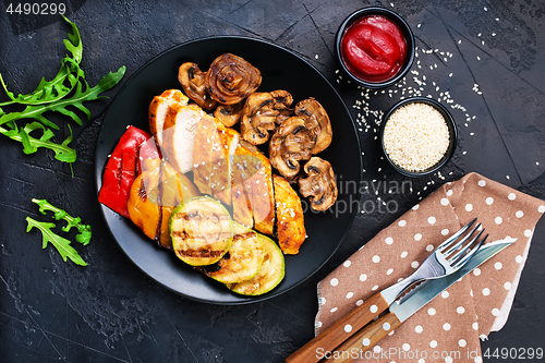 Image of chicken meat with grilled vegetables