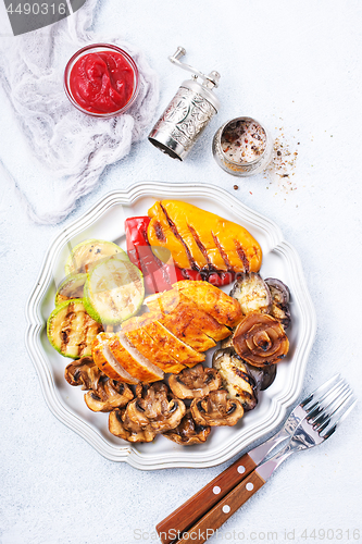 Image of chicken barbecue and grilled vegetables