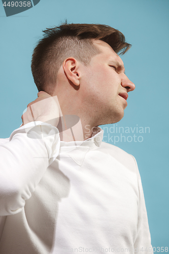 Image of Beautiful bored man isolated on studio background