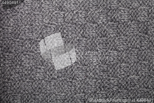 Image of Knitted grey scarf texture 