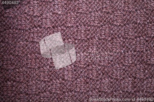 Image of Knitted brown scarf texture