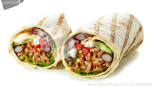 Image of Tortilla wrap with fried minced meat and vegetables