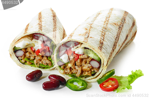 Image of Tortilla wrap with fried minced meat and vegetables