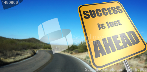 Image of Success is just ahead road sign