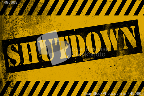 Image of Shutdowne sign yellow with stripes