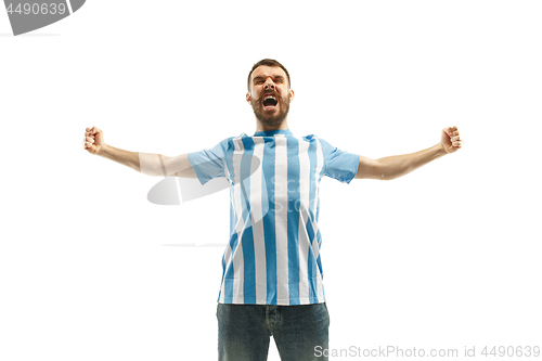 Image of The Argentinean soccer fan celebrating on white background