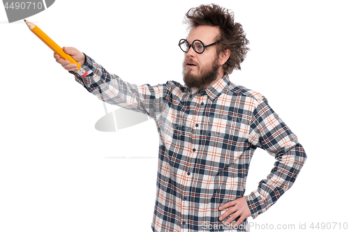 Image of Crazy bearded man with big pencil