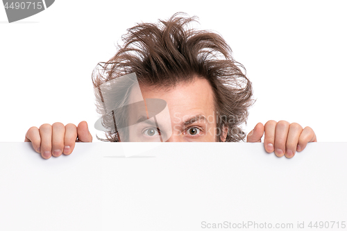 Image of Crazy man with blank signboard