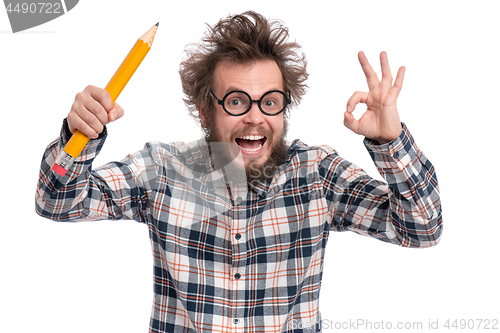 Image of Crazy bearded man with big pencil