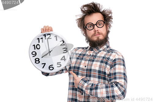 Image of Crazy bearded man with big clock